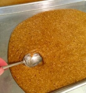 Spreading English Toffee With Spoon