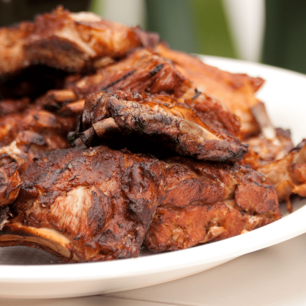 BBQ Ribs Stacked on a Serving Platter