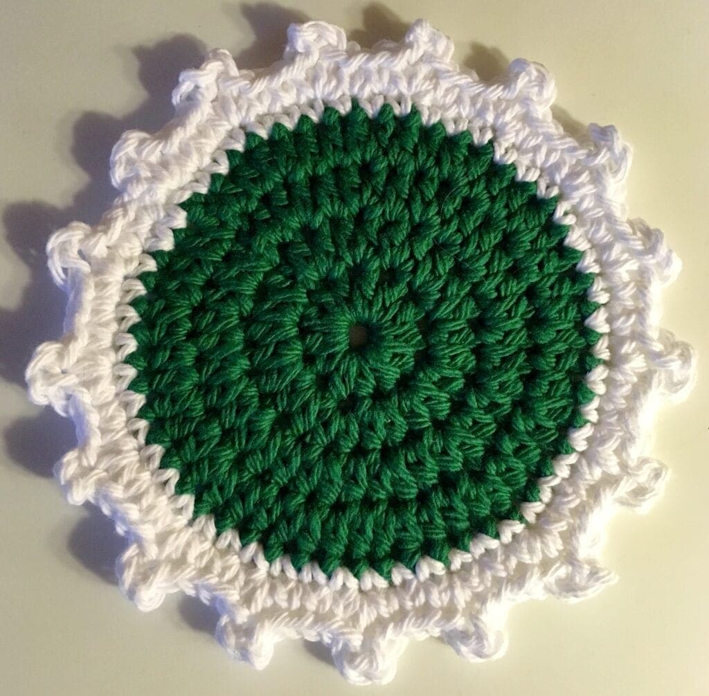 Close up of Green and White Coaster