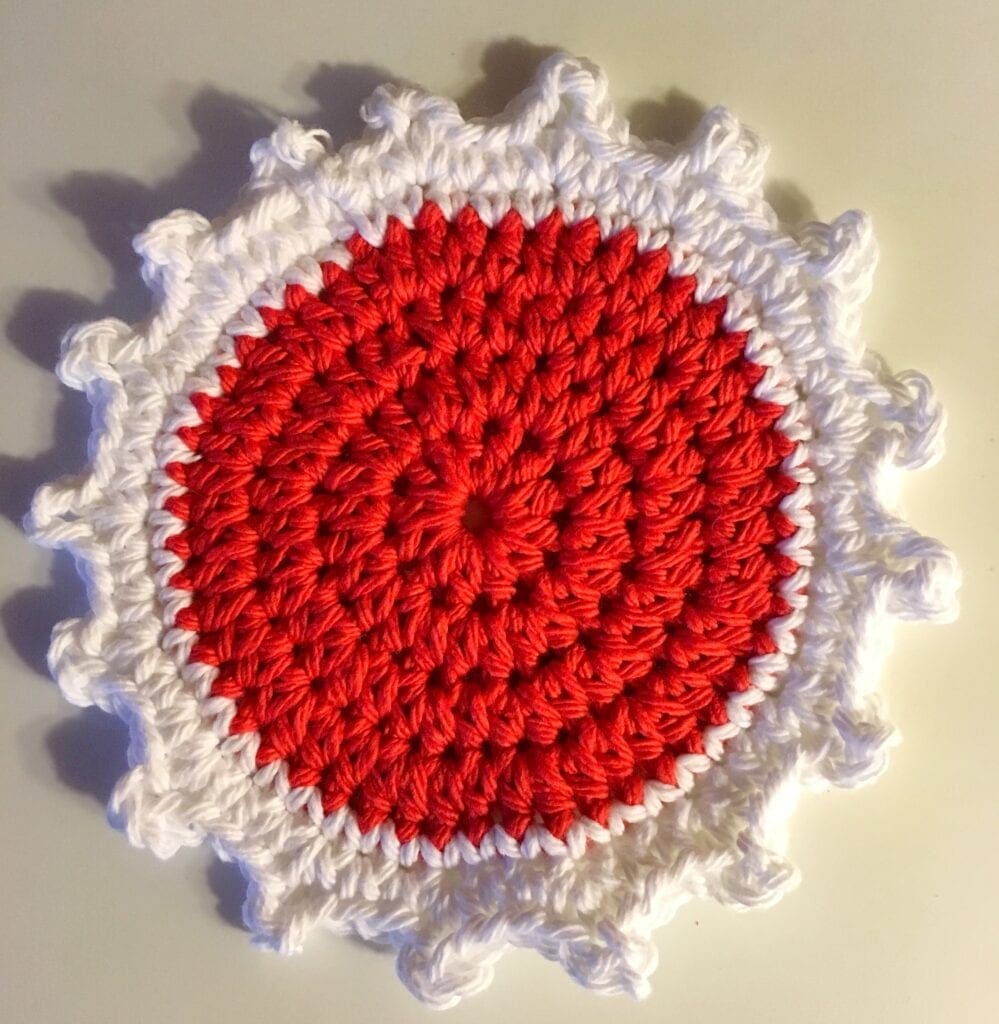 Close up of Red and White Coaster