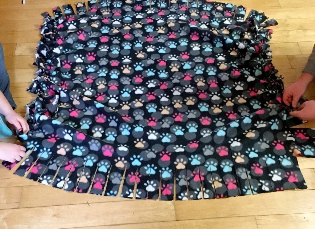Tying Fleece Blanket for Charity