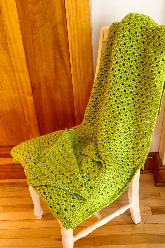 Springtime Crochet Blanket Folded on Chair