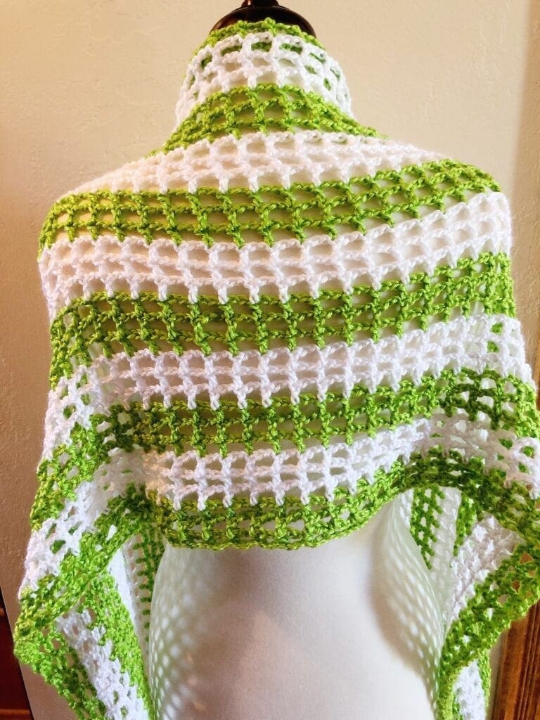 green and white lacy rectangle shawl styled