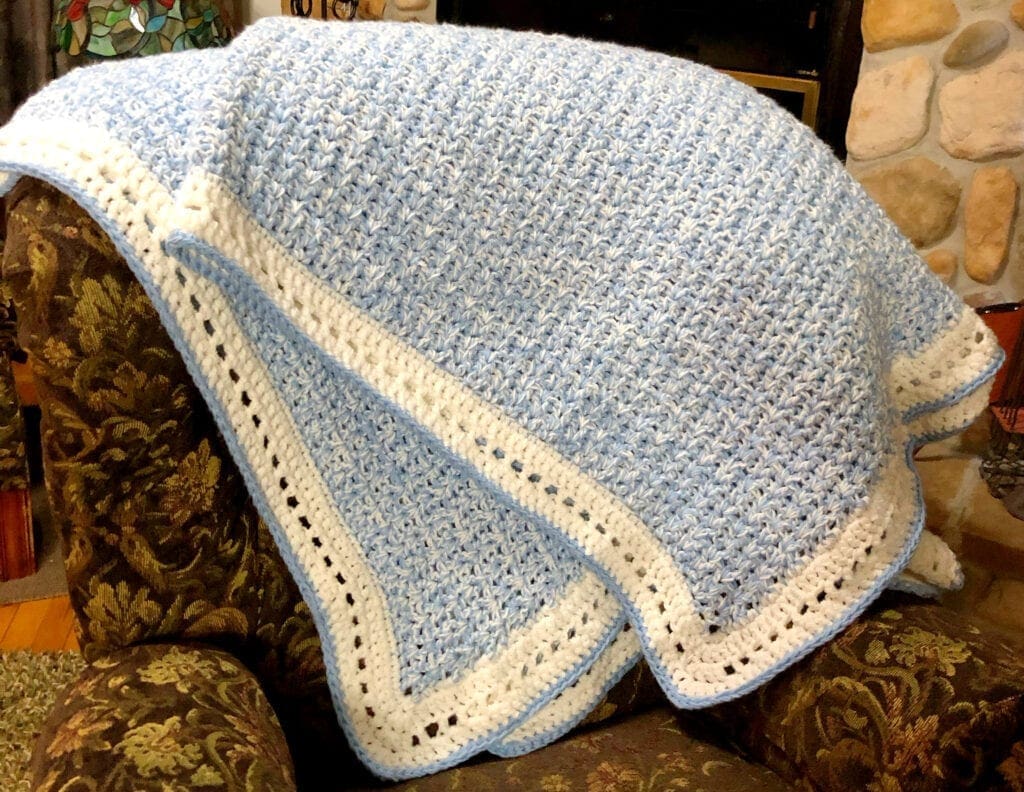 Afghan Folded and Laying Over the Back of a Chair