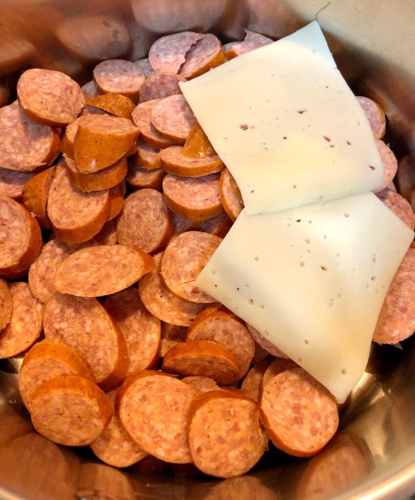 Layering Cheese on Kielbasa