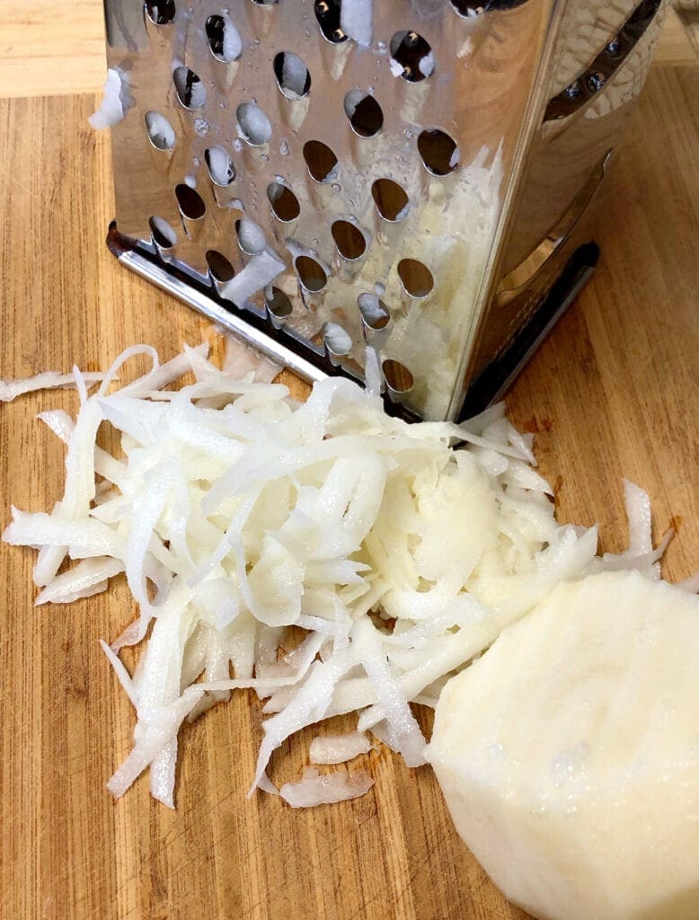 Grating Potatoes on a Box Grater