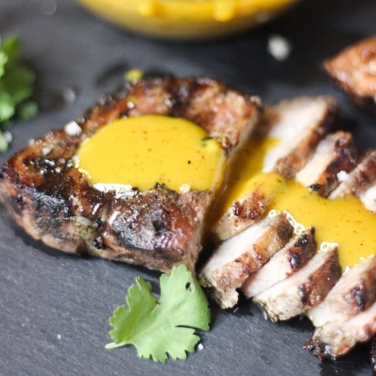 sous vide boneless pork chops with tangy Carolina yellow mustard BBQ sauce