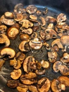 Cooking Mushrooms in Skillet Until Browned