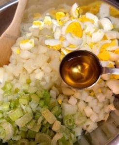 Adding Cider Vinegar to the Warm Potatoes