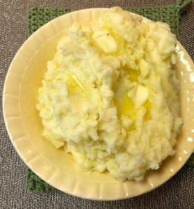 Cauliflower and Mashed Potatoes Served with Butter