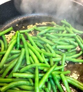 Adding Beans to Garlic in Skillet