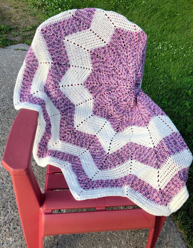 Crochet 12-Point Star Blanket Over Chair Outside