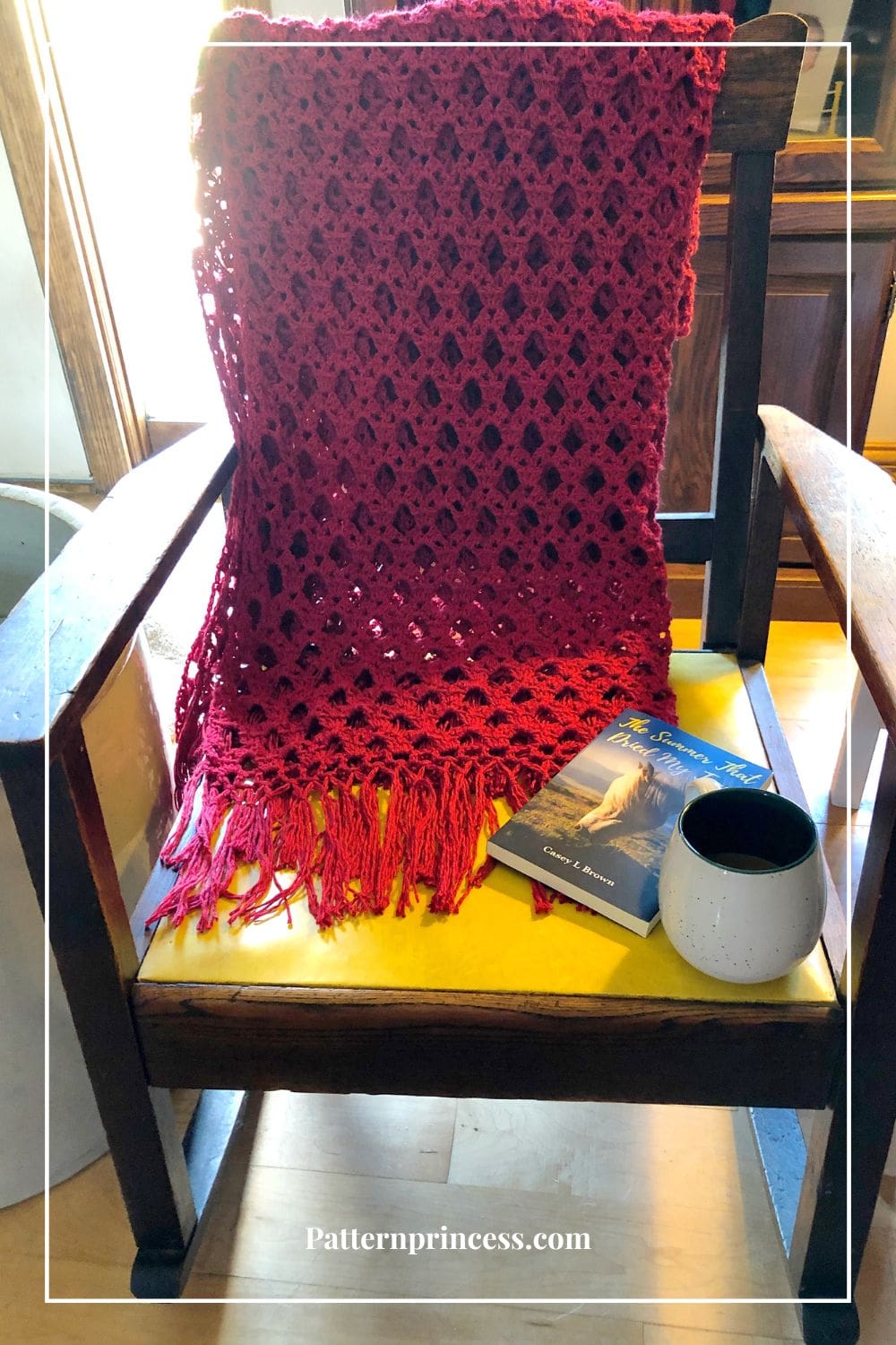 Lacy Crochet Throw Blanket with Book and Cup of Coffee on Rocking Chair