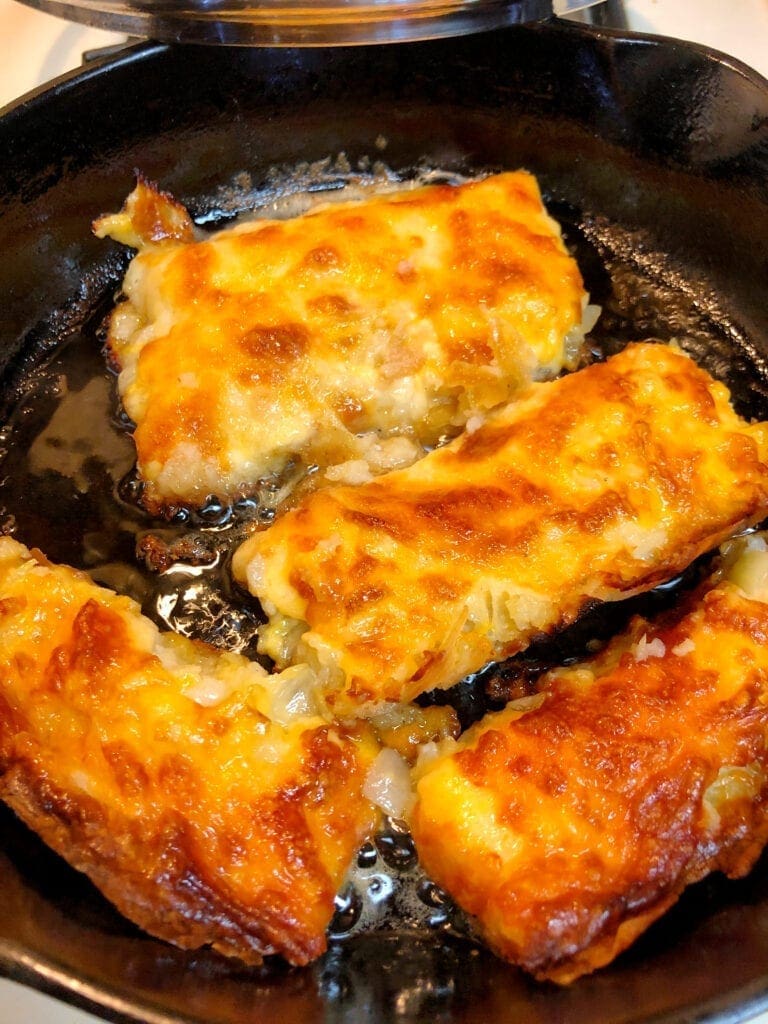 Reheating Leftover Cheesy Onion Hash Brown Bake in a Cast Iron Skillet