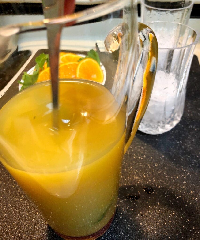 Mixing Orange Cooler in a Picture