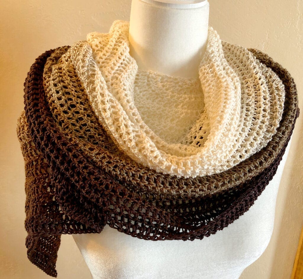 Tan and Brown Crochet Shawl Wrapped Over Shoulders