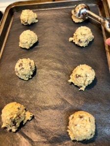 Placing 2-inch Drop Cookies on Cookie SheetPlacing 2-inch Drop Cookies on Cookie Sheet