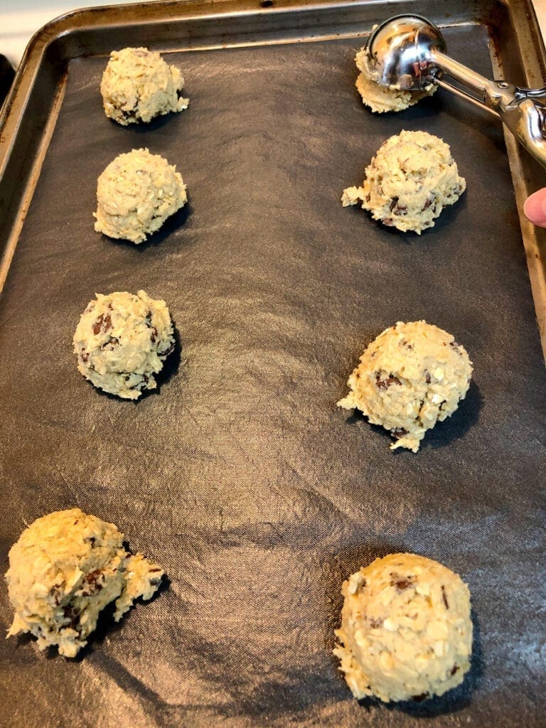 Placing 2-inch Drop Cookies on Cookie Sheet