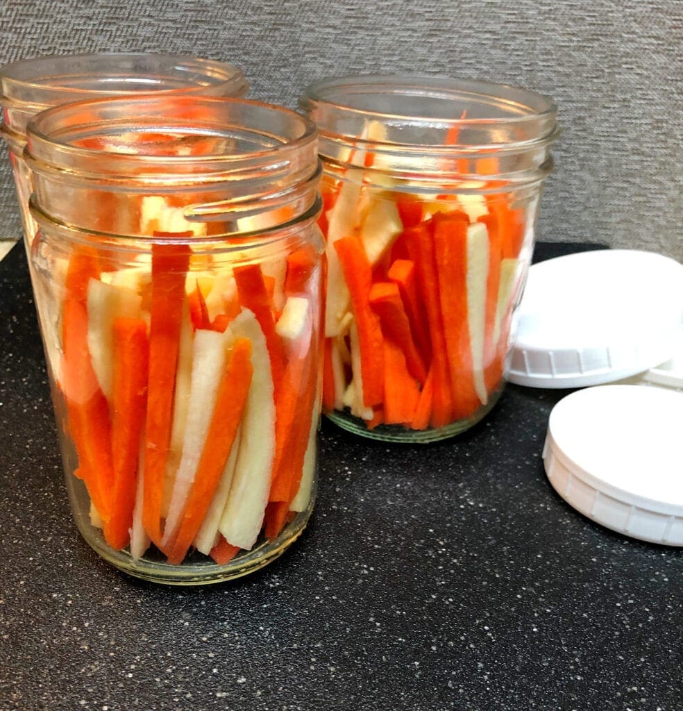 Carrot and Daikon Quick Pickle Recipe packed in 3 pint jars