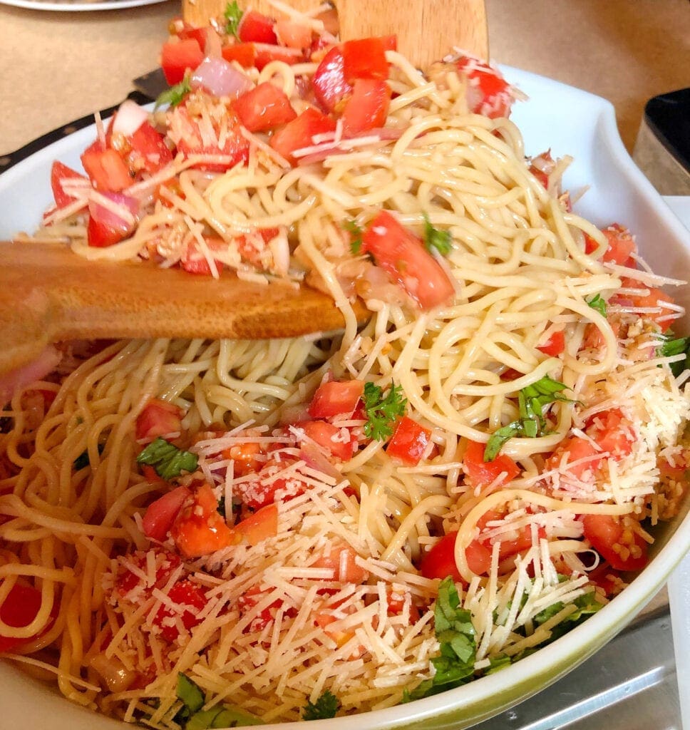 Toss Tomato Mixture with Pasta