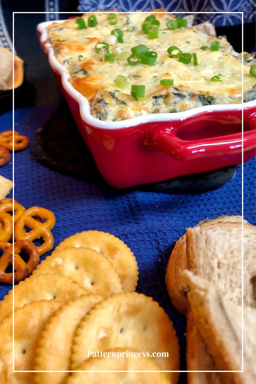 Spinach Dip Served with Chips and Pretzels