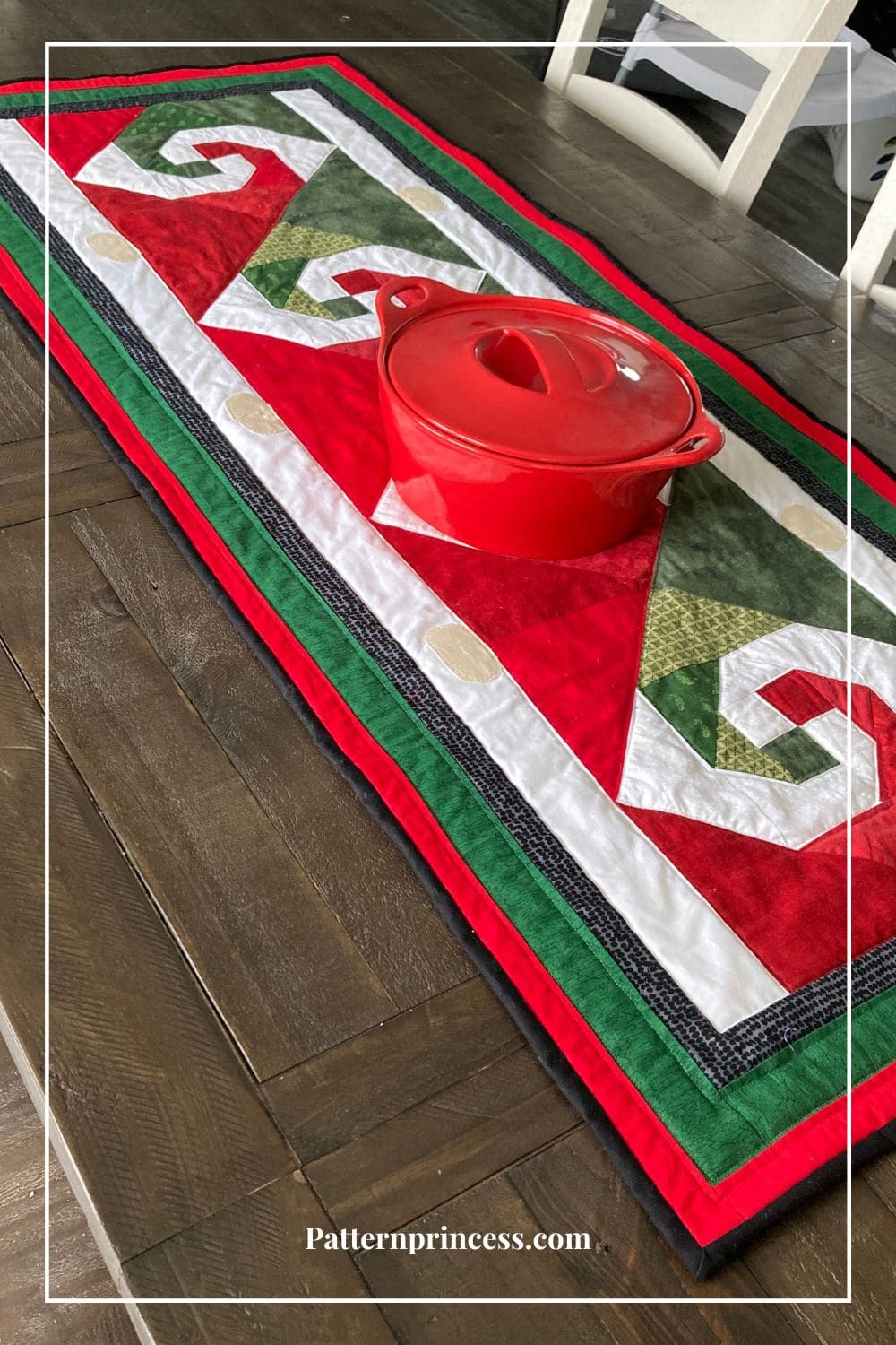 Santa Gnomes Displayed on Table with Red Casserole Dish