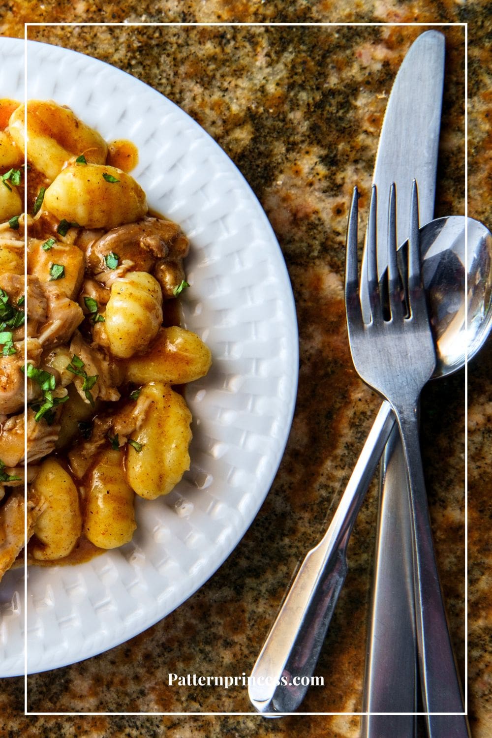 Skillet Chicken Gnocchi on plate with silverware