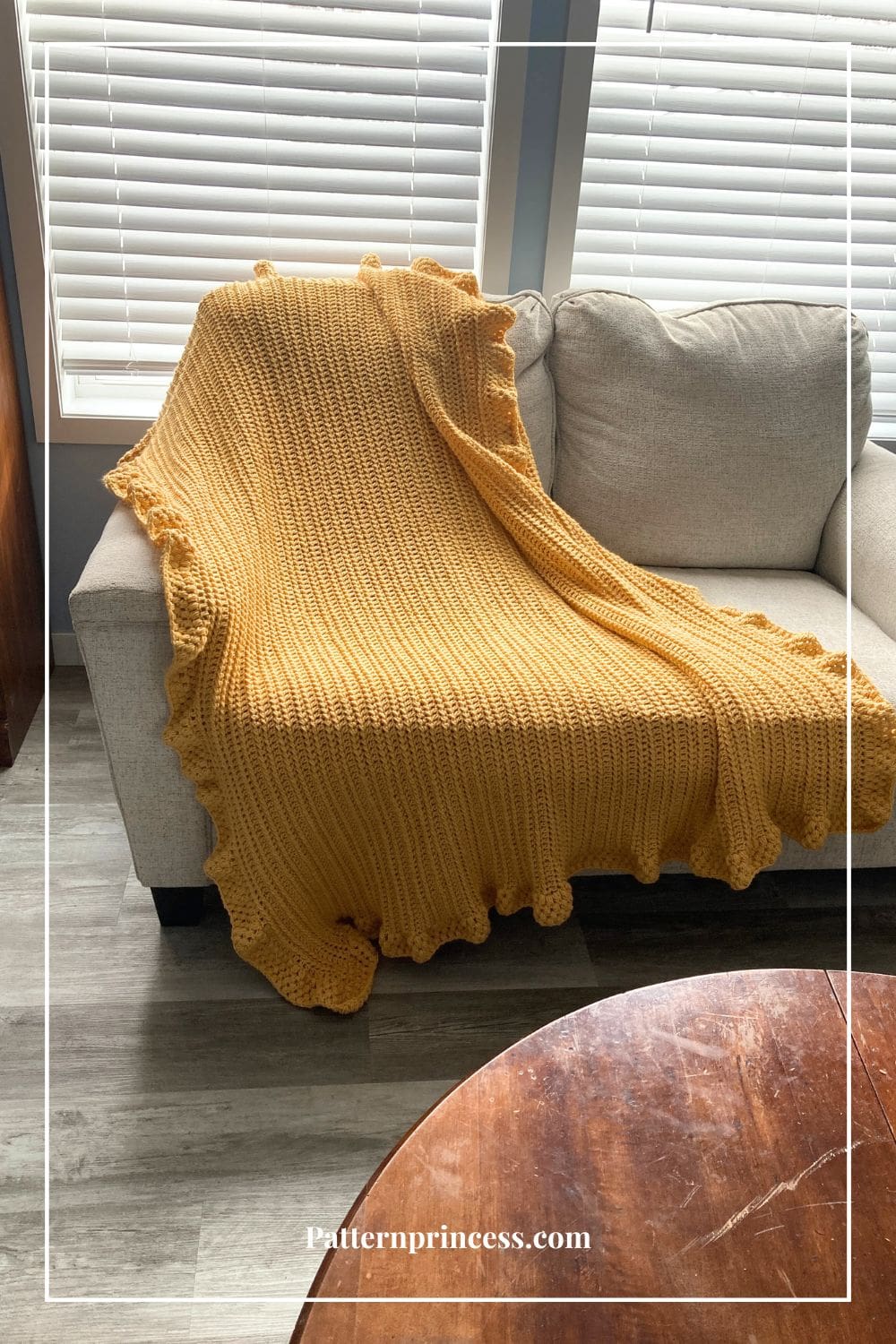 Mustard Color Blanket Laying on Sofa