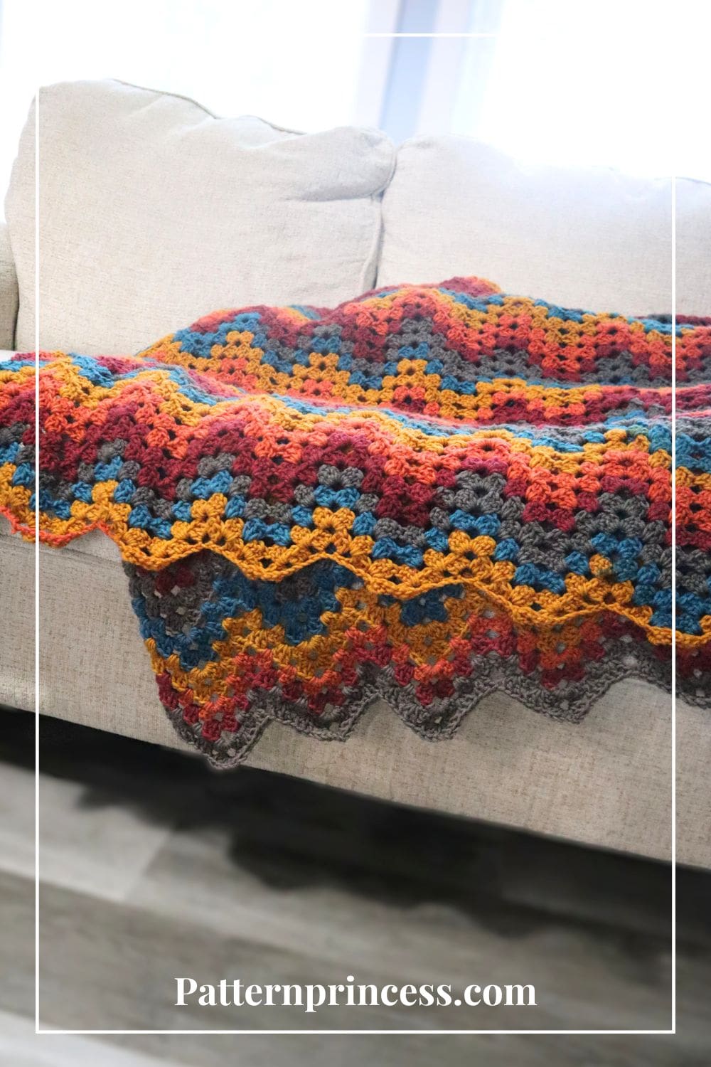 bright colored crochet afghan on sofa