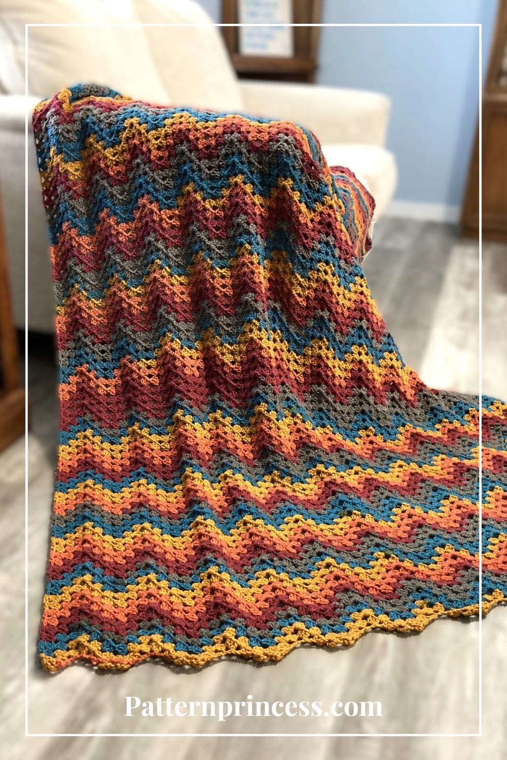 granny ripple zigzag afghan draped on sofa
