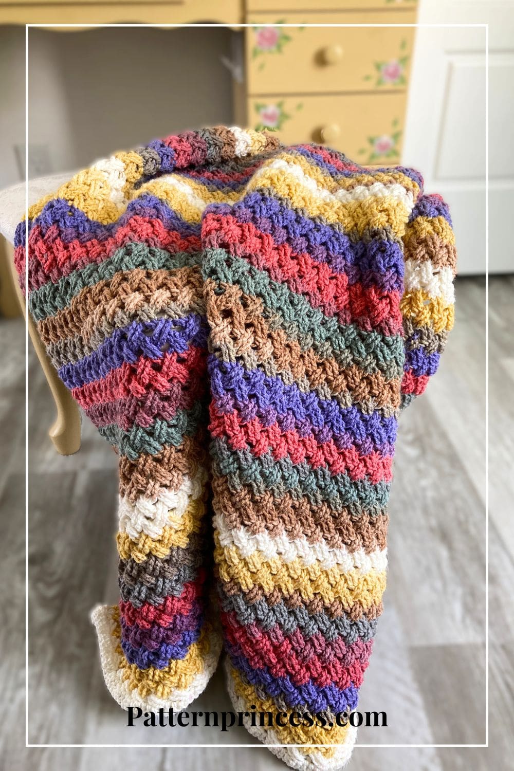 Celtic Weave Striped Blanket on Bench