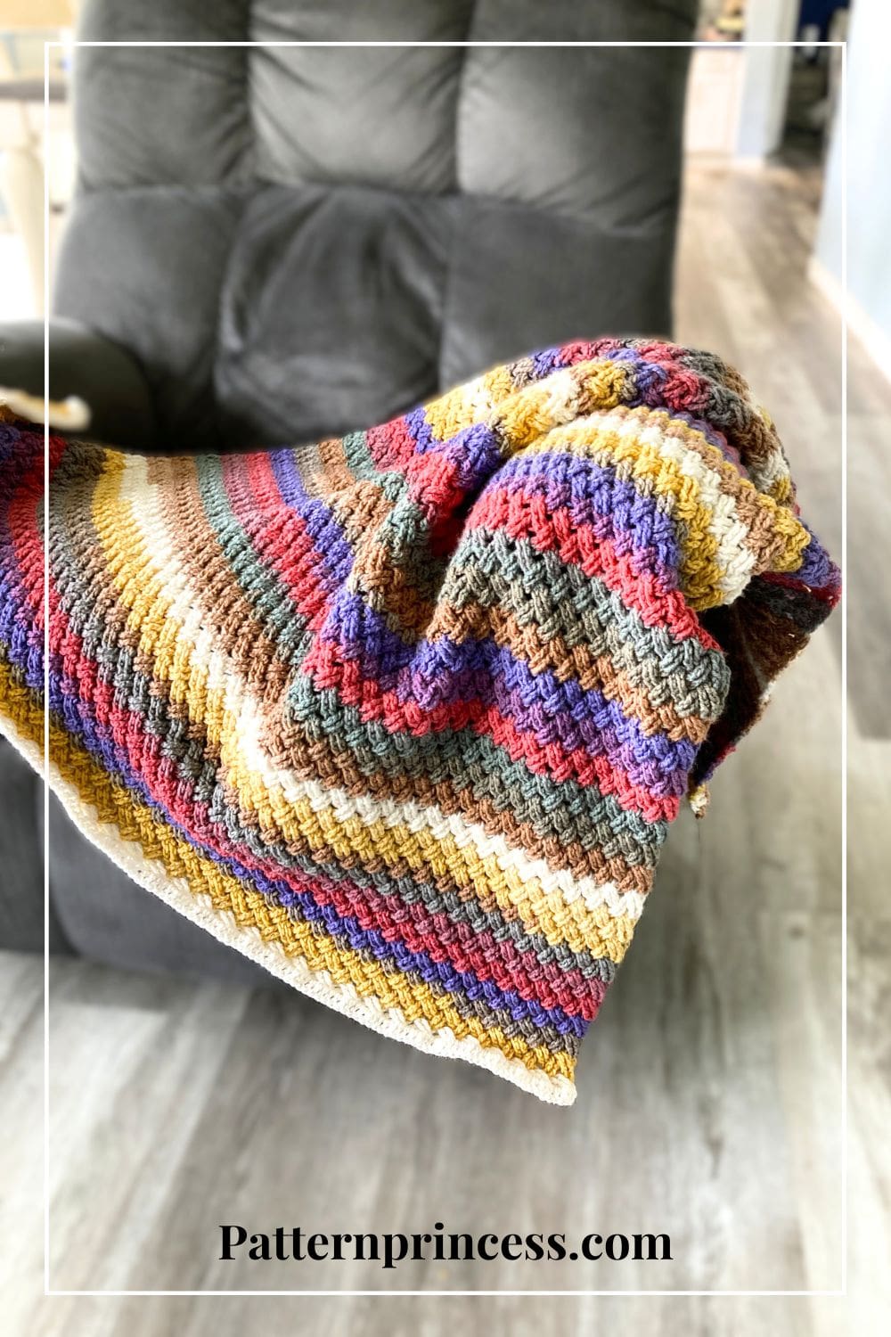 Textured striped toddler blanket on chair