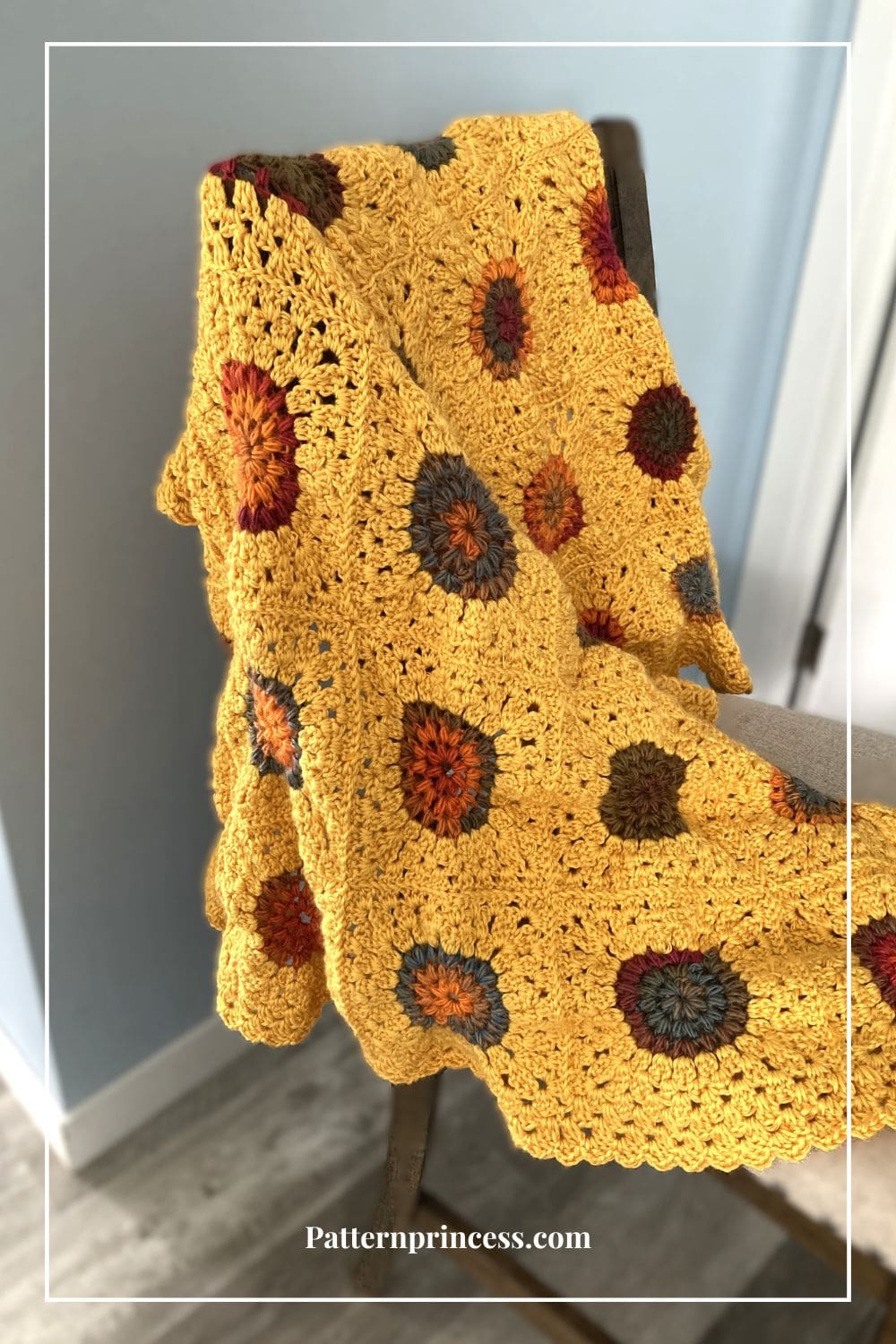 Sunburst Granny Throw Blanket on Chair