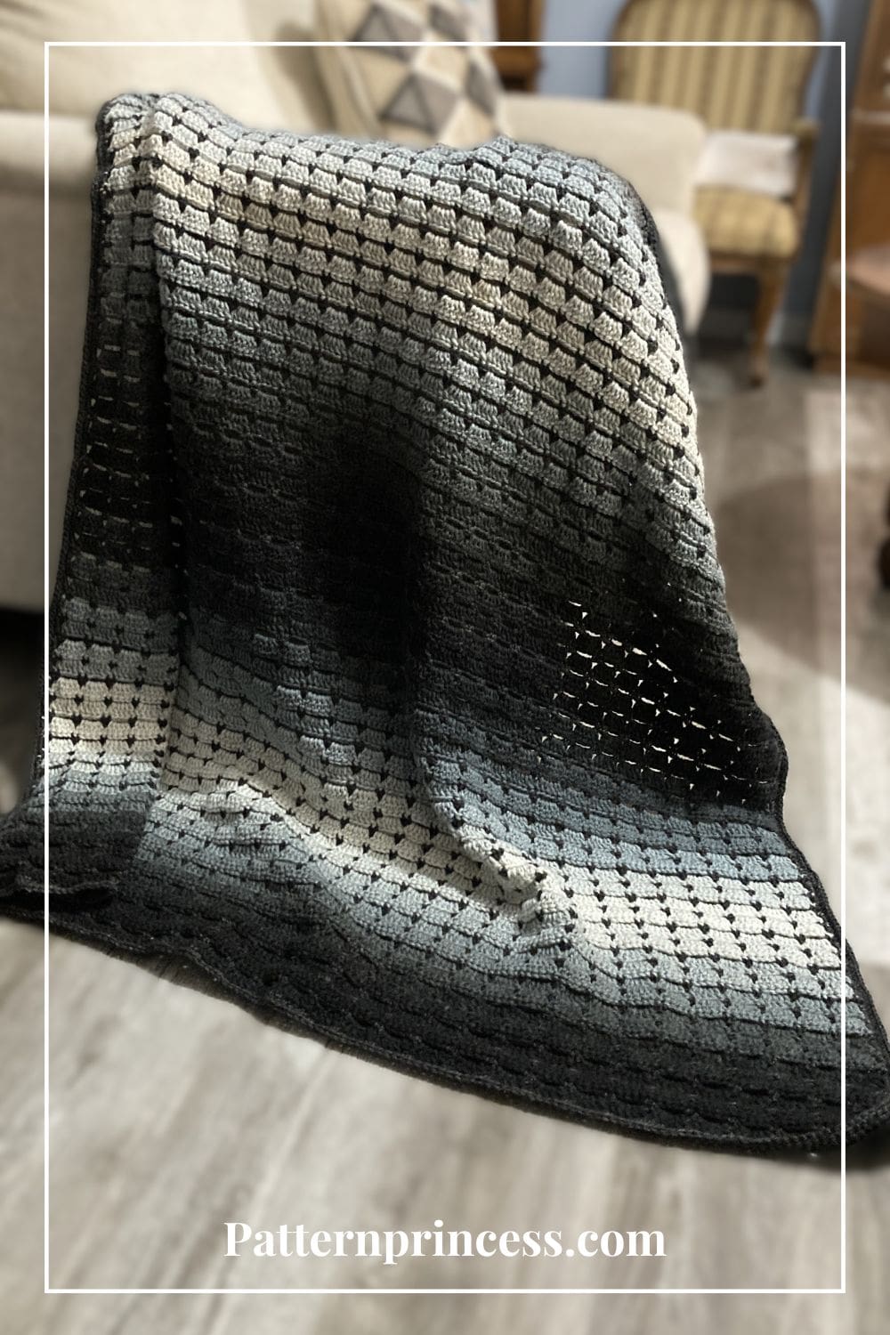 Gradient Yarn Beginner Friendly Crochet Blanket Draped on Sofa