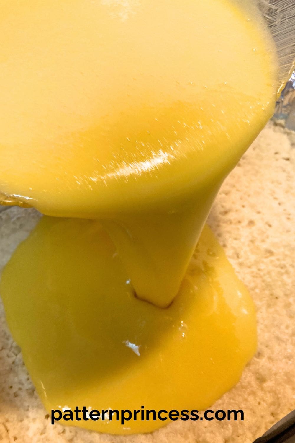 Pouring Lemon filling into Buttery Shortbread Crust