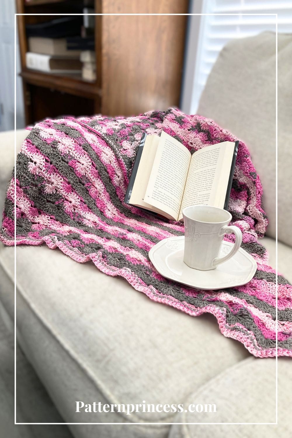 Crochet Blanket on Sofa with book and cup