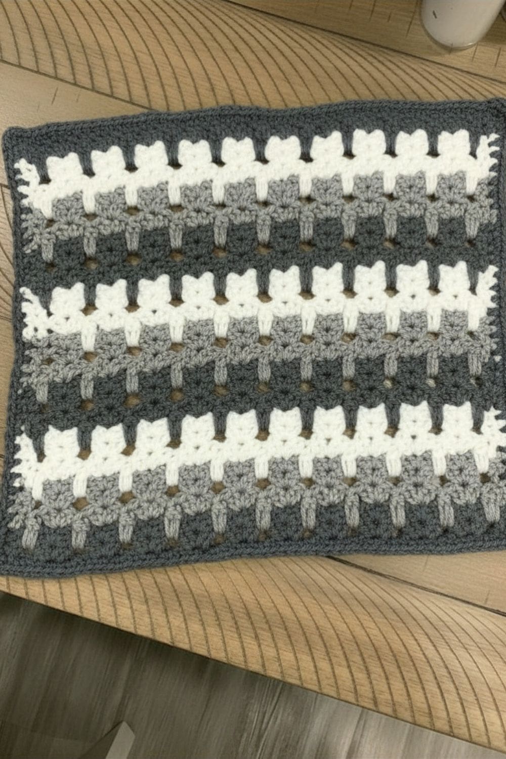 grey and white cat stitch